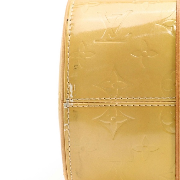 Louis Vuitton Bedford Papillon
Handbag in Monogram Mango Vernis - Picture 8 of 10